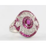 A platinum ruby and diamond Art Deco style dress ring, size N,