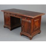 A Victorian mahogany free standing counter/desk with carved apron, fitted 1 long and 2 short