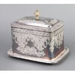An Edwardian silver plated biscuit box decorated with scrolls