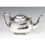 A Georgian silver repousse teapot raised on ball feet, 769 gramsThe hallmarks are rubbed