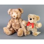 A Steiff brown and white mohair teddy bear with articulated limbs 40cm together with a brown
