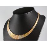 An 18ct three colour gold flat link necklace, 38.5 grams