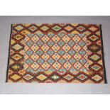 A blue, brown and black ground Chobi Kilim rug 188cm x 126cm