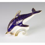A Royal Crown Derby Imari pattern paperweight in the form of a dolphin with silver stopper 17cm