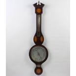 An Edwardian aneroid barometer and thermometer in an inlaid mahogany case, the silvered dial