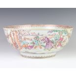 An 18th Century famille rose bowl decorated with panels of figures at pursuits, the interior with