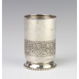 A Continental circular silver vase with repousse decoration 9cm, 123 grams