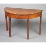 A 19th Century mahogany demi-lune table raised on 4 square supports 71cm h x 106cm w x 53cm d