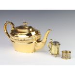 A gold plated demi-fluted teapot together with a salt and tankard