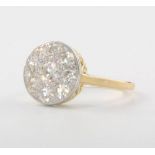 An 18ct yellow gold diamond cluster ring approx. 1.15ct, size N