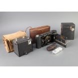 A Minox spy camera, a no. C2 Brownie folding camera, a no.120 box camera and a Brownie model C box