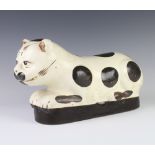 An antique style Chinese ceramic pillow in the form of a reclining cat 36cm