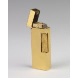 A gentleman's gold plated Dunhill pocket cigarette lighter