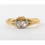 An 18ct yellow gold 2 stone diamond ring, size L, 3.2 grams