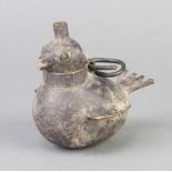 A Persian bronze oil lamp in the form of a bird 8cm x 11cm