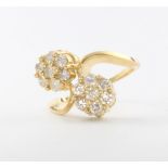 An 18ct yellow gold diamond double cluster ring, size M, 5.8 grams