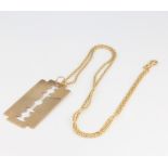 A 9ct yellow gold razor pendant and chain 6.6 grams