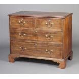 A 19th Century mahogany chest of 2 short and 2 long drawers with brass swan neck drop handles,