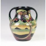 A modern Moorcroft 2 handled baluster vase decorated with a view of Ireland beneath trees 18cm dated