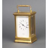 St James, a 20th Century carriage timepiece with enamelled dial and Roman numerals contained in a