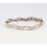 A 14ct white gold diamond bracelet, 17.8 grams