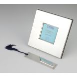 A modern silver square photograph frame 12cm, together with a ditto book mark, 84 grams