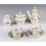 A French part coffee set with coffee pot, sugar bowl and cover, 2 tea cups and saucers and a cream