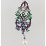 A silver Art Nouveau style ruby, enamel and pearl brooch (1 stone missing)