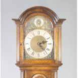 A chiming longcase clock with 25cm arched gilt dial with silvered chapter ring, striking St