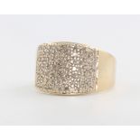 A 9ct yellow gold diamond pave set ring, size S, 7.2 grams