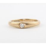 A 9ct yellow gold single stone diamond ring, size K 1/2, 2.5 grams