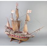 A wooden model La Santa Maria 70cm x 80cm x 6cm (The Santa Maria was the largest of 3 ships used
