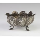 An Indian repousse silver lobed bowl on scroll feet, 10cm, 76 grams