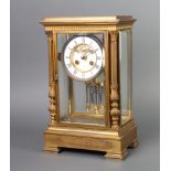 P Buhre, a French 19th Century striking 4 glass clock with visible escapement and Roman numerals