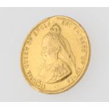 A gilt commemorative coin 1837-1897