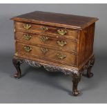 A Queen Anne crossbanded walnut chest of 3 long drawers with replacement brass plate drop handles,