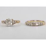 A 9ct yellow gold diamond half eternity ring size O and a ditto diamond cluster ring size N 1/2