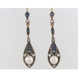 A pair of silver gilt diamond, pearl and sapphire drop earrings
