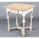 A 17th Century style limed oak side table fitted a drawer raised on cup and cover supports with X