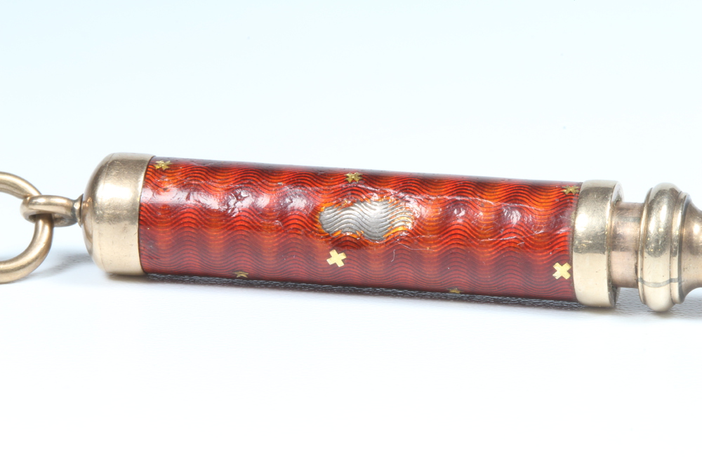 An Edwardian gilt and enamelled propelling pencil by S Morden & Co, 10cm There is a chip to the - Image 2 of 4