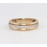 A 9ct yellow gold diamond set half eternity ring 3.4 grams, size M This ring is in good condition