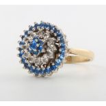 A 9ct yellow gold gem set target ring, size N 1/2, 6.4 grams