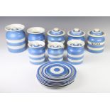 Three Green & Co blue and white kitchen jars and covers with green mark to base, a ditto with no