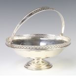 A silver swing handled cake basket with pierced rim, Sheffield 1929, 20cm, 416 grams