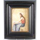 A 19th Century Continental painted porcelain panel depicting a young lady sitting on a stool, framed
