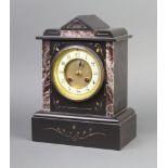 A Victorian 8 day striking mantel clock with enamelled dial and Arabic numerals contained in a 2