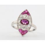 A platinum marquise cut ruby and diamond up finger ring, size n