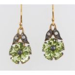 A pair of silver gilt peridot and diamond floral earrings