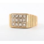 A gentleman's 18ct yellow gold 12 stone diamond ring, size V, 11.8 grams
