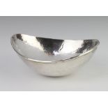 A South American, hammer pattern, egg shaped silver dish 11cm, 69 grams